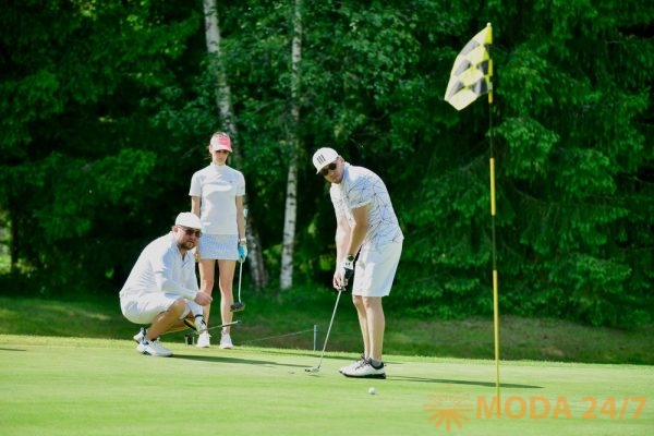 Участники гольф-турнира